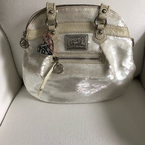 White all sequin Coach bag.